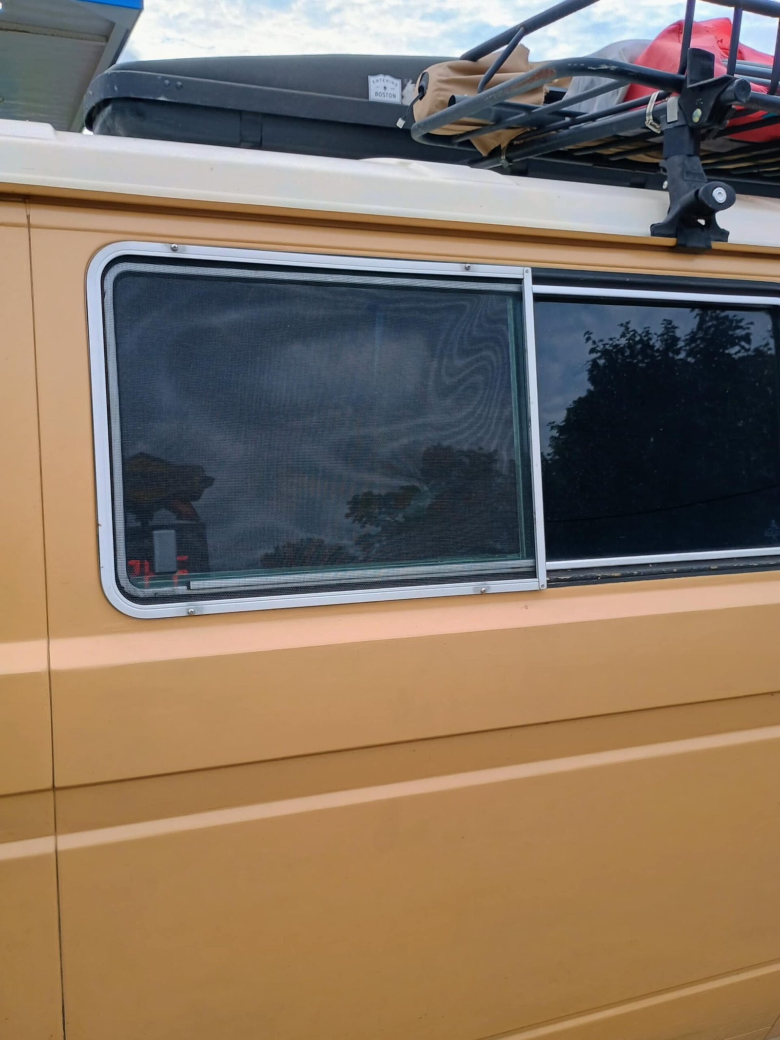 Tin top window screen mounting bracket for Vanagon